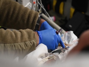 Medical teams save soldier during historic flight