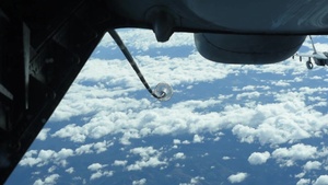 Travis KC-10 refuels Navy EA-18 Growlers