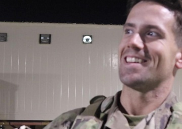 Son visits father in Kuwait on the way home from Iraq