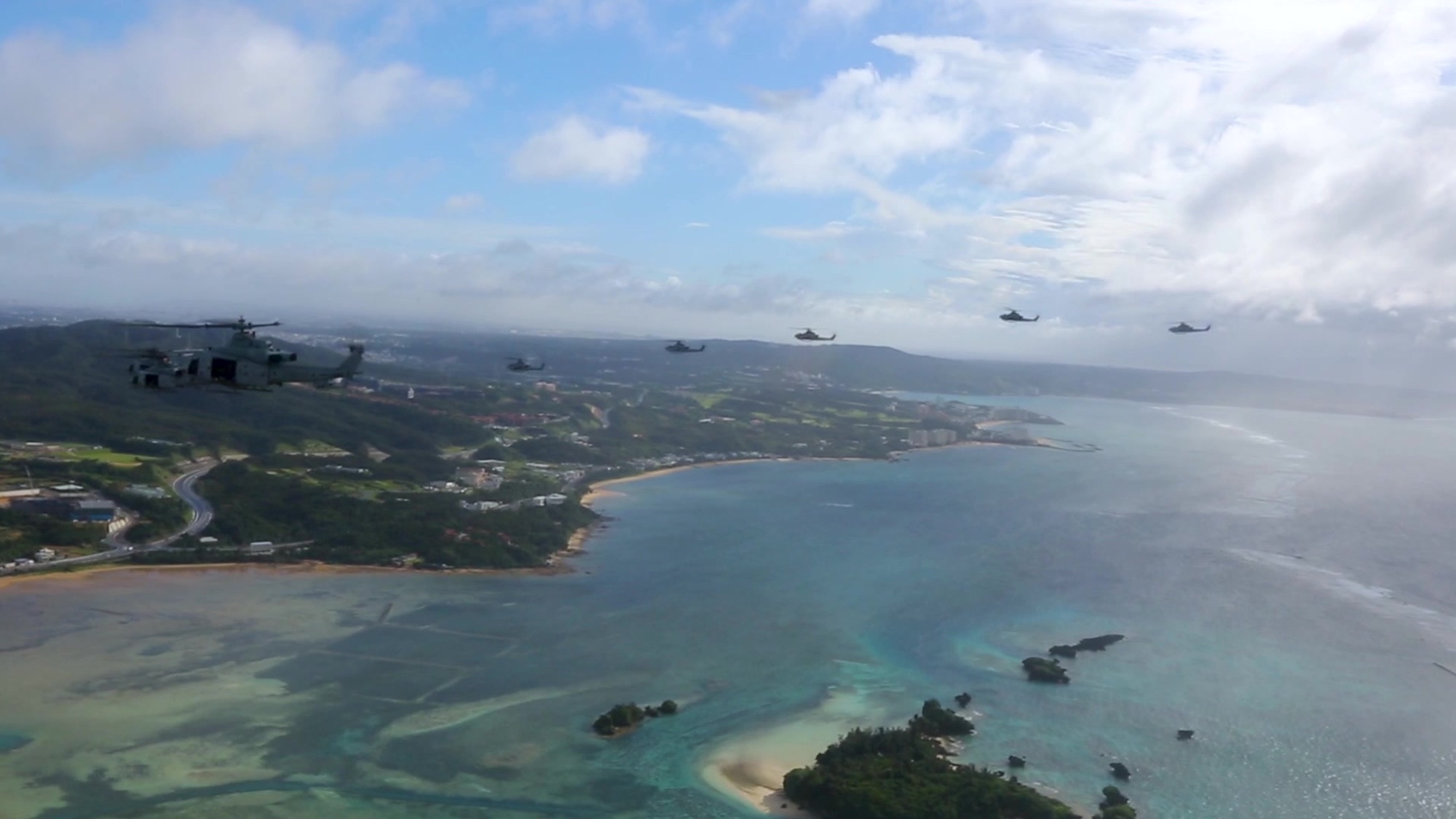 Six AH-1Z Viper helicopters and six UH-1Y Huey helicopters with Marine Light Attack Helicopter Squadron 169 participate in a formation over Okinawa, Japan, Sept. 19, 2019. HMLA-169 successfully and safely launched 12 aircraft for a single flight as a display of appreciation for the hard work of the squadron. (U.S. Marine Corps video taken by Lance Cpl. Gerardo W. Cano)