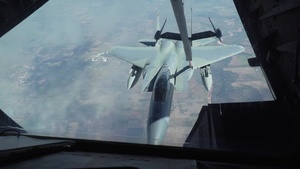 Travis KC-10 Extender refuels 57AW F-15C Eagles