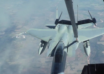 Travis KC-10 Extender refuels 57AW F-15C Eagles