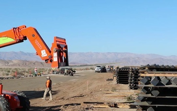 Task Force Barrier contractors install barrier panels in Yuma, Ariz.