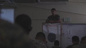 Aspiring U.S. Marine Corps Combat Marksmanship Coaches recieve pistol marksmanship classes