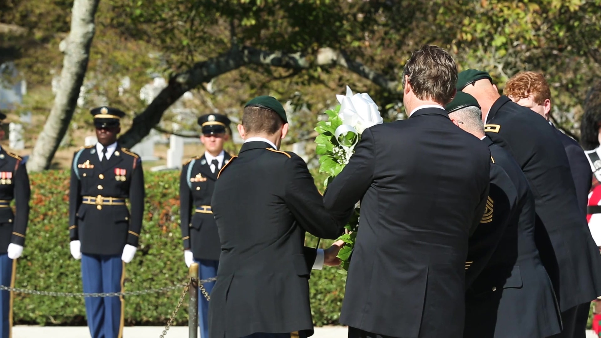 Rep. Joe Kennedy III, Maj. Gen. John Deedrick, Command Sgt. Maj. Tomas Sandoval, 1st Special Forces Command (Airborne), and Dr. William Kennedy Smith participate in laying a wreath at The John F. Kennedy Eternal Flame at Arlington National Cemetery, Arlington, Arlington, Virginia on Oct. 23, 2019. The ceremony is held yearly to commemorate President Kennedy’s contributions to the U.S. Army Special Forces, including authorizing the “Green Beret” as the official headgear for all U.S. Army Special Forces and his uncompromising support to the regiment. (U.S. Army video by Spc. Wheeler Brunschmid)