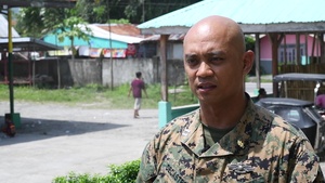 U.S. Navy Sailors, Philippine Airmen, and Philippine Marines take part in a cooperative health engagement activity during KAMANDAG 3