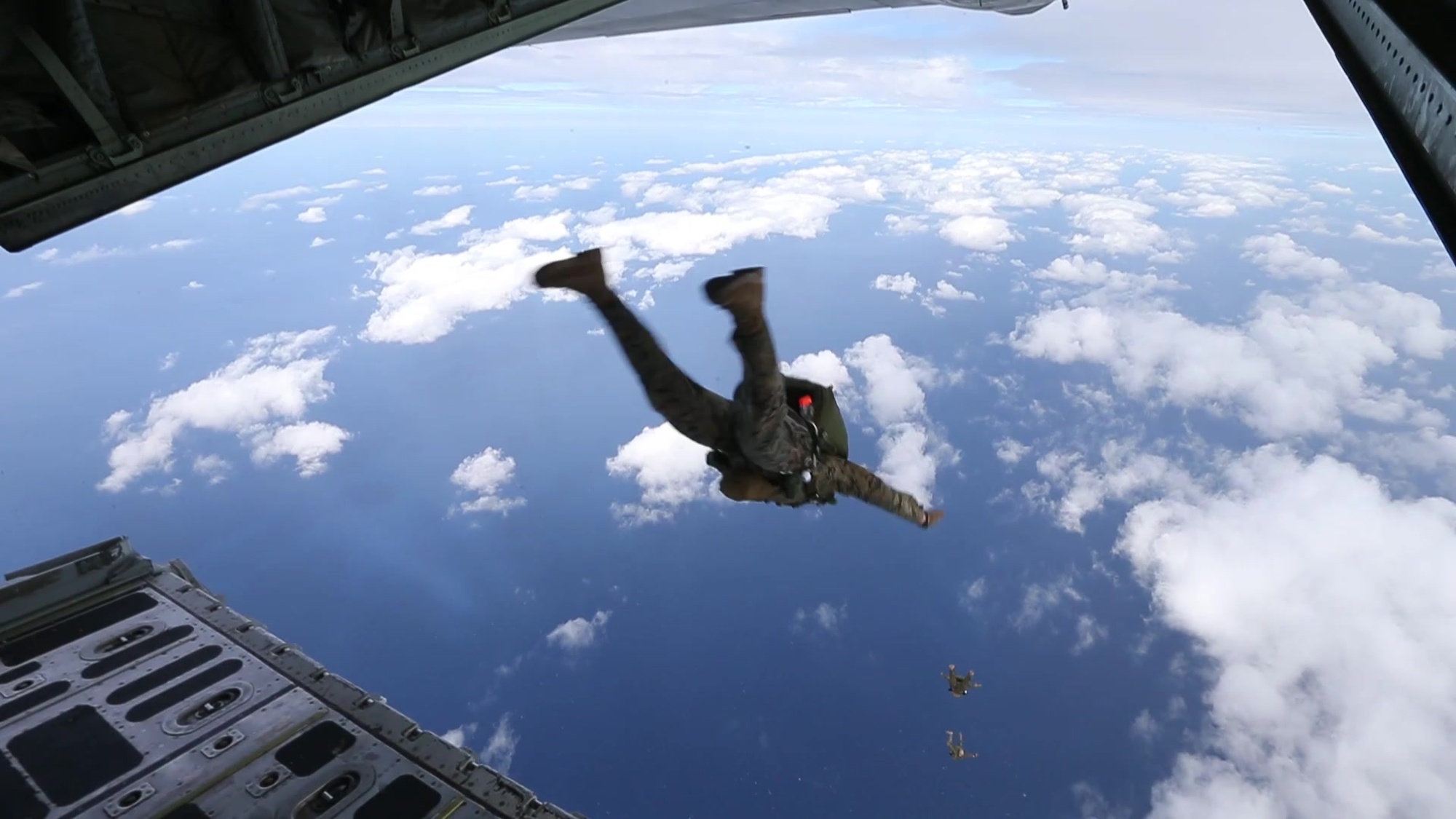 U.S. Marines with 3rd Reconnaissance Battalion, 3rd Marine Division conduct parachute operations by jumping out of a KC-130 Hercules and a UH-1N Huey on Ie Shima, Okinawa, Japan, Oct. 28-30, 2019.  This combined training included Marines from 3rd Transportation Support Battalion, 3rd Marine Logistics Group, as well as support from Marine Aerial Refueler Transport Squadron 152 and Marine Light Attack Helicopter Squadron 169, 1st Marine Aircraft Wing.  This military training ensures the Marines from III Marine Expeditionary Force are constantly trained and ready to provide aerial delivery of personnel or equipment wherever needed, quickly and effectively.