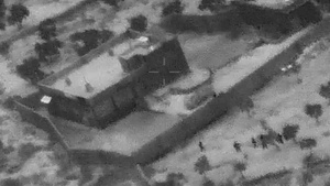 The U.S. assault force moves toward the objective.