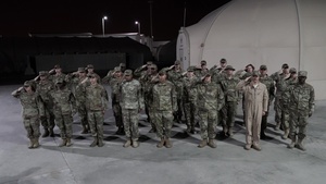 Military formation and salute for National Anthem