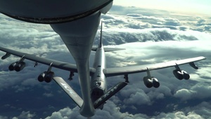 U.S. Air Force KC-135 Boom Operator refuels B-52