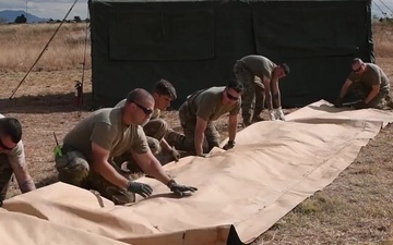 B-roll of Squadron Commander Meeting and tent tear down