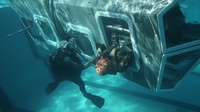 Camp Pendleton Marines submerge in Helo Dunker