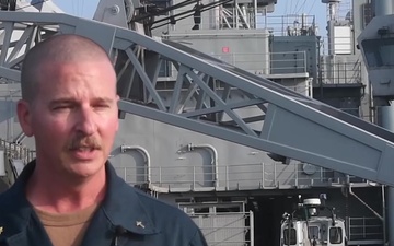 Lt.Cmdr. Sluder aboard the USS Germantown (LSD 42) send Thanksgiving message home while deployed in the 7th Fleet AOR