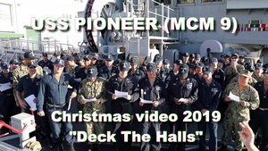 USS Pioneer crew sings a holiday song for family and friends