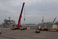 Soldiers help load cargo onto the LSV-5 at Port Shuaiba, Kuwait