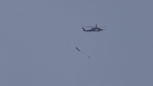 Broll Footage of Special Operations Soldiers conducting airborne operations over water.