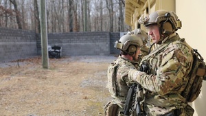 B-Roll Footage of Special Forces Green Berets conducting room clearing and breaching drills.
