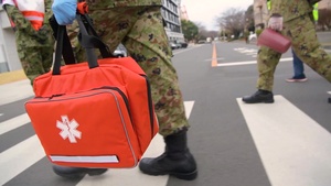 Medical personnel perform checks on Yama Sakura 77 participants
