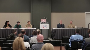 BRoll of Marines conducting a panel on character building at AVCA 2019