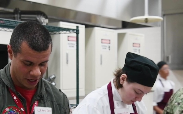 VFA-102 Sailors, MC Perry High School students team up to cook