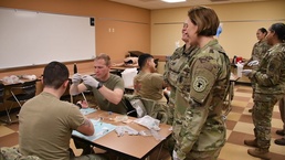Physician Recruiter Assists in Combat Medic Sustainment Training