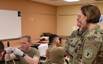 Physician Recruiter Assists in Combat Medic Sustainment Training