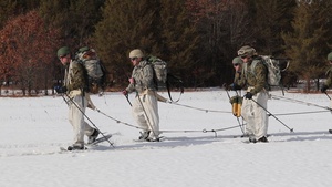 Fort McCoy Cold-Weather Operations Course Class 20-03 students conduct field training in snowshoes