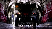 Marines load HIMARS into KC-130J