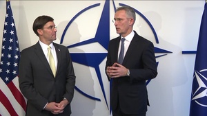 Handshake between the NATO Secretary General and the US Secretary of Defense