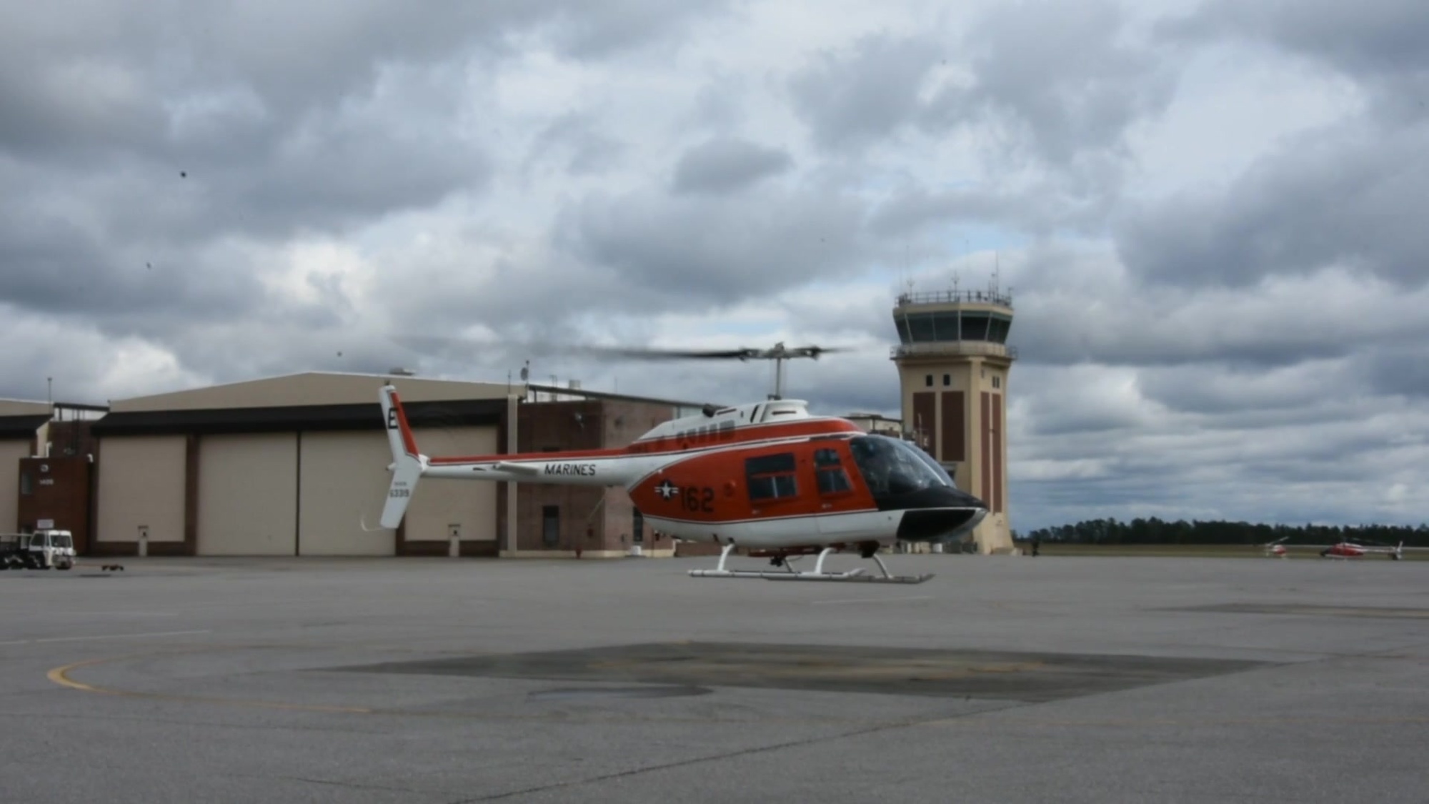 NAS Whiting Field South Field training flight operations, TH-57 Bell Sea Ranger training helicopter takes off with instructor and student pilots