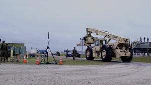 U.S Marines and Sailors unload HE off the improved Navy lighterage system at MPFEX20