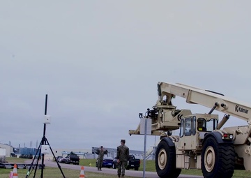 U.S Marines and Sailors unload HE off the improved Navy lighterage system at MPFEX20