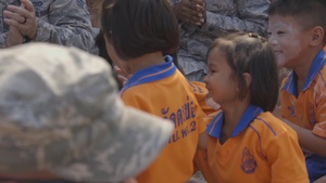 Cobra Gold 20: U.S. Service Members and members of the Royal Thai Air Force partake in games and activities with the students of Wat Dong Khoi School
