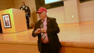 Spec. Eric Burri's Father John speaks during Rigger Hall of Fame Induction Ceremony