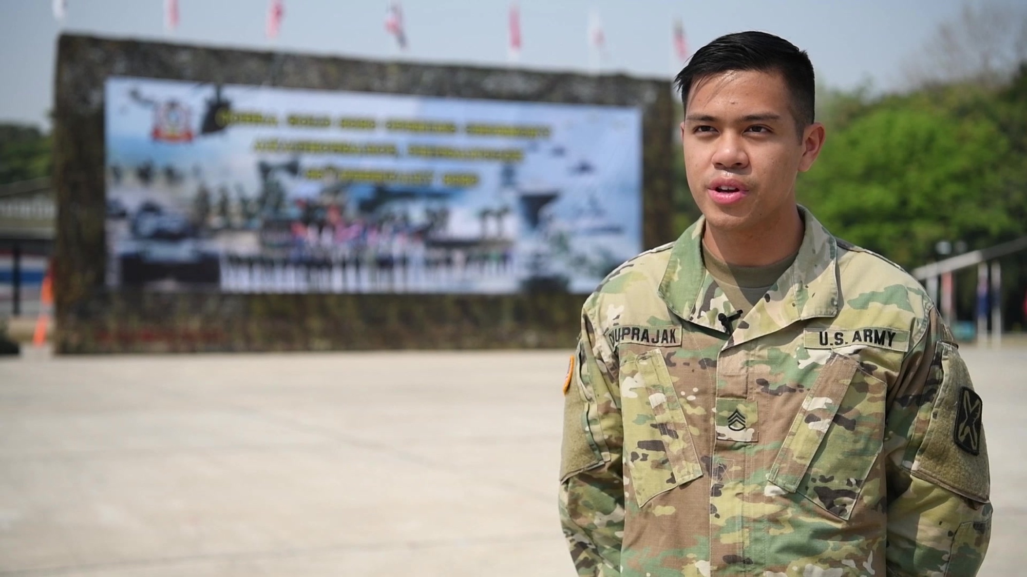 U.S. Army Staff Sgt. Panuwatr Chuprajak, a Thai language translator for exercise Cobra Gold 2020, explains details about his job and his journey into the military on Camp Akathotsarot, Phitsanulok province, Kingdom of Thailand, Feb. 24, 2020. Chuprajak, a native of Salt Lake City, is a a member of the Utah National Guard 300th Military Intelligence Brigade. Cobra Gold 20 demonstrates the commitment of the Kingdom of Thailand and the United States to our long-standing alliance, promotes regional partnerships and advances security cooperation in the Indo-Pacific region. (U.S. Air Force video by Staff Sgt. Dhruv Gopinath)