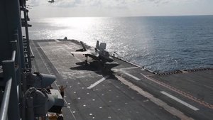 USS America (LHA 6) conducts flight operations