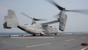 USS America (LHA 6) conducts flight operations