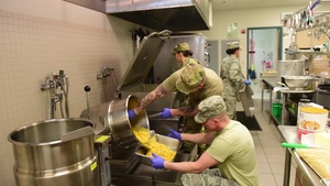 178th Force Support Squadron members prepare for drill weekend meal