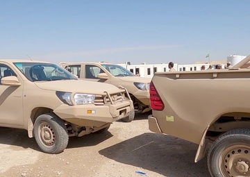 Coalition Forces transfer arms, equipment, vehicles to Iraqi forces