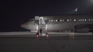 B-Roll: aircraft carrying returning Wisconsin citizens arrives at Volk Field Combat Readiness Training Center as Wisconsin National Guard Troops stand ready to provide ground transportation during mobilization for COVID-19 response