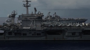 Ships from the Theodore Roosevelt Carrier Strike Group, the America Expeditionary Strike Group, and the U.S. 7th Fleet command ship, USS Blue Ridge (LCC 19), transit the Philippine Sea during Expeditionary Strike Force operations.