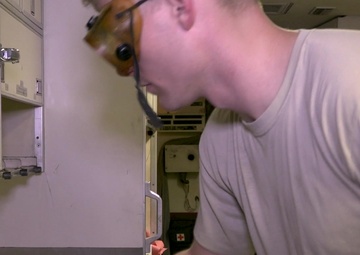 Joint STARS crew chiefs practice COVID-19 mitigation aboard aircraft