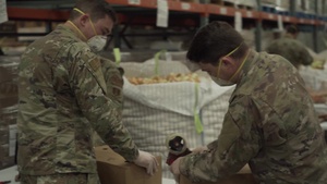 141st Air Refueling Wing and 242d Combat Communications Squadron Airmen assist local food bank during COVID-19
