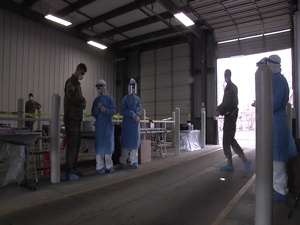 Soldiers and Airman prepare to open the Harwood Heights Testing Site in Chicago