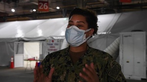 Interview with U.S. Navy Hospital Corpsman 1st Class Brittany Berkley, shift team lead with the patient transport team, who explains patient transfer protocol from the pier to the Military Sealift Command hospital ship USNS Comfort (T-AH 20).