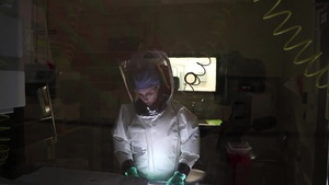 USAMRIID Biosafety Level 4 Door Sign & Scientists at Work