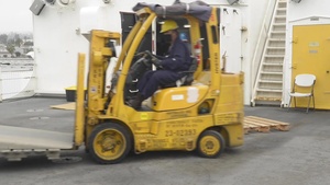 USNS Mercy Sailors, MSC Civilian Mariners Hoist New Patient Beds