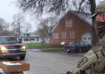 Nebraska Soldiers help distribute food in Tecumseh