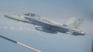 F/A-18C Hornets with VMFA-115 refuel with VMGR-152
