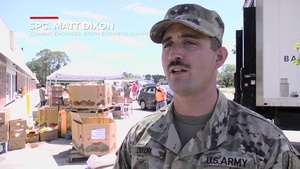 Soldiers Distribute Food to Panacea Residents with Second Harvest